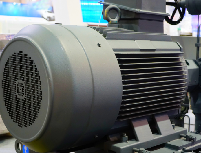 electric-motor-repair 11Close-up view of an electric motor system with wiring, components, and industrial machinery parts.