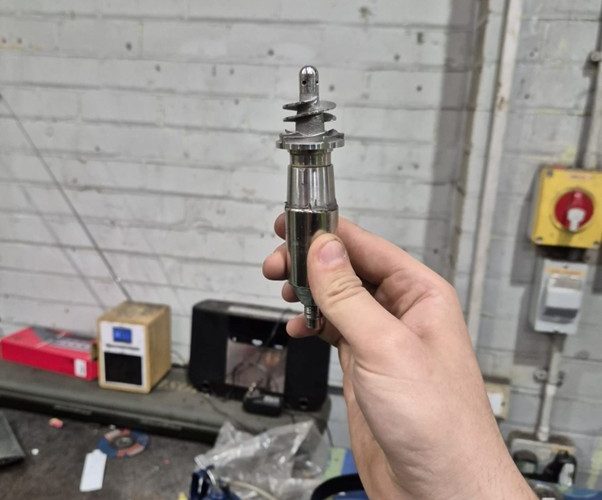 11Rocket rotor component undergoing dynamic balancing to improve performance and reduce vibration.