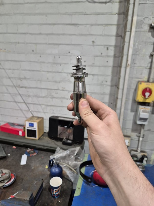 11Rocket rotor component undergoing dynamic balancing to improve performance and reduce vibration.