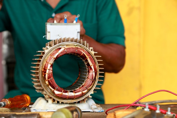 11Electric motor repairing showing an old motor needing maintenance and repair service.